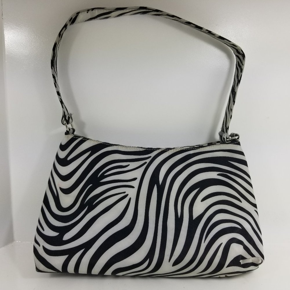 Vintage zebra shoulder bag wit zip closure and inside zip pocket